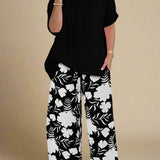 Sæt Andrée | Mønstrede Bukser + Ensfarvet Top